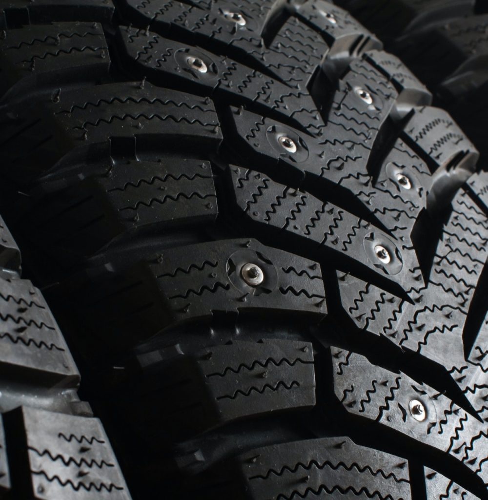 winter-tires-with-spikes-for-a-car-close-up.jpg